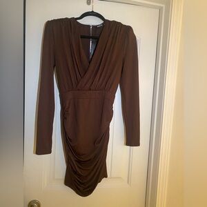 Nasty Gal NWT bodycon mini with shoulder pads for the extra snatched look.